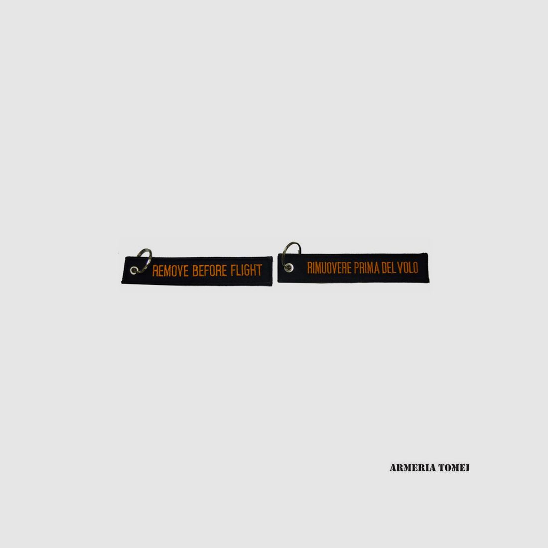 SCHLÜSSELANHÄNGER STOFF REMOVE BEFORE FLIGHT SCHWARZ-ORANGE