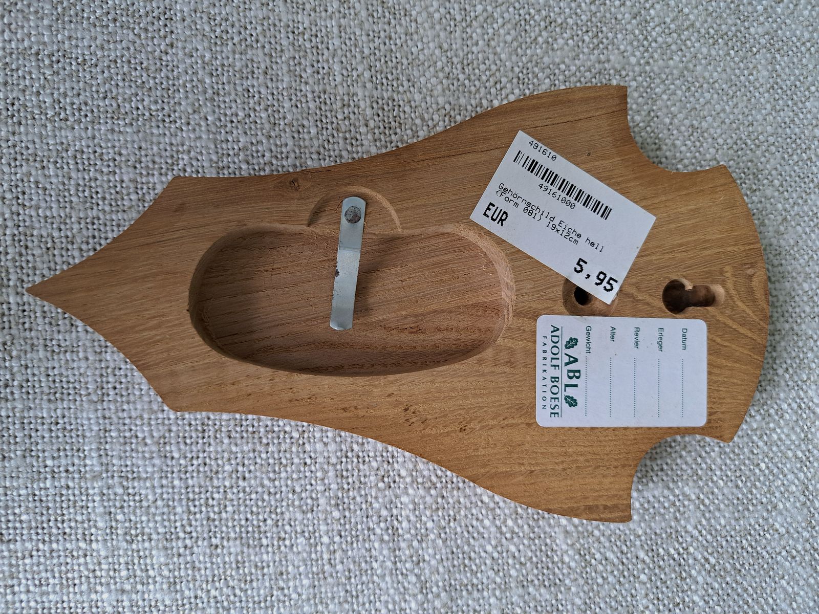 For sale: nearly new horn shield made of light oak.