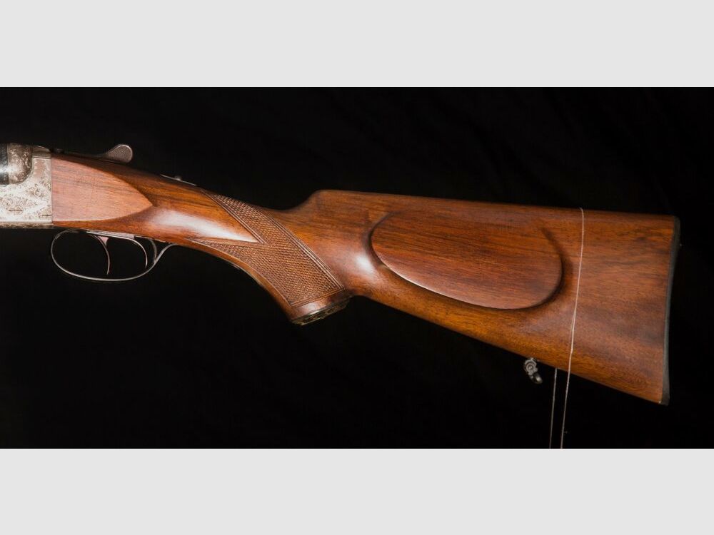 elegante Doppelflinte mit umfassender Gravur