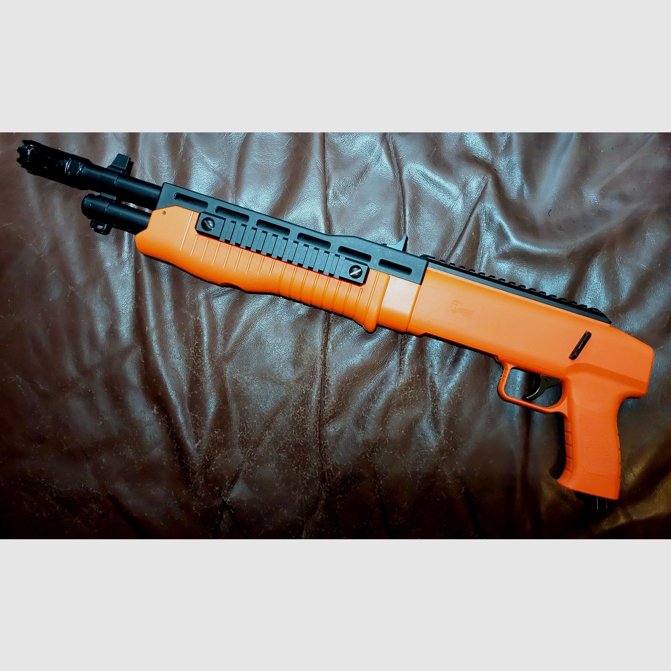 T4E Umarex  HDB 68 CO2-RAM Shotgun Kal. .68 orange/schwarz 
