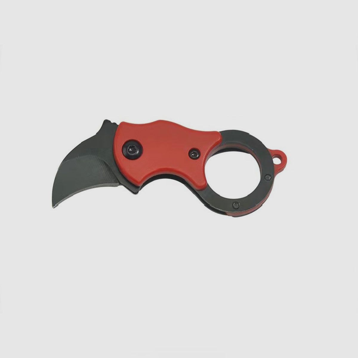 RAM SURVIVAL – MINI KARAMBIT CON CLIP | ARANCIO