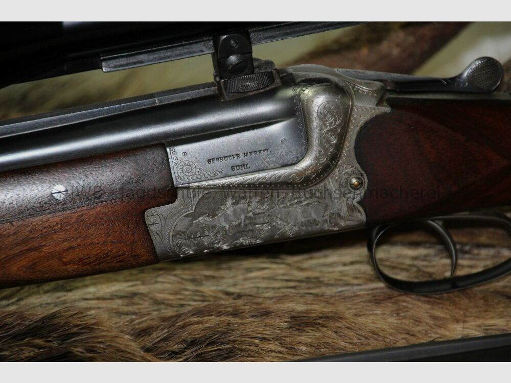 Merkel double-barreled shotgun with interchangeable double-barrel and variable sight 12/70; 7x57R