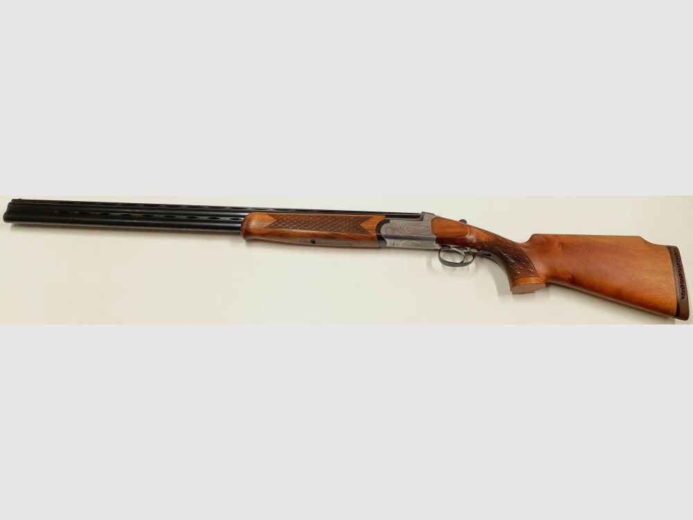 A.V.Maroccini trampa de bosque con grabados muy bonitos en calibre