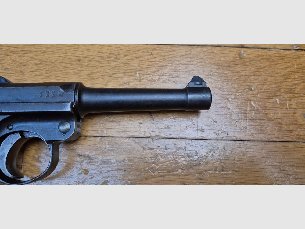 Very nice Luger P08 Pistol World War I – Manufactured by DMW in 1918 reintroduced to the Reichswehr in 1920 – Fully matching including magazine (rare!) – Very nice barrel – Rare piece due to its history and condition -TBE-/TBE, image 23 of 24