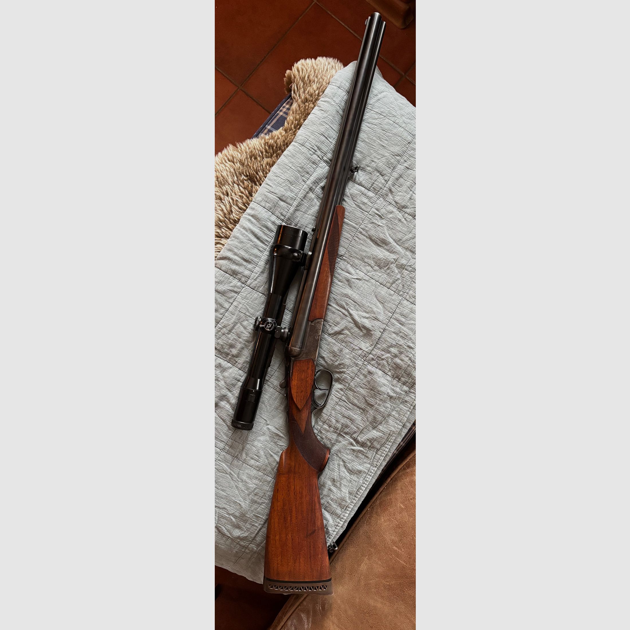 Merkel Drilling mit moderner ZF-Montage und LL-EL im Rehwildkaliber