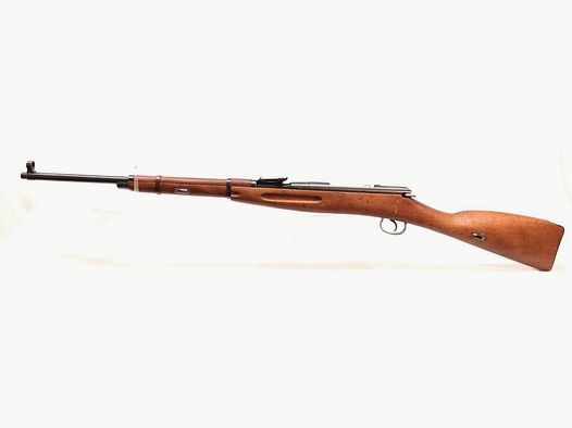 Karabin treningowy Mosin Nagant - karabin treningowy, z numerami zgodnymi, przedni metalowy uchwyt w kolorze brązowym.