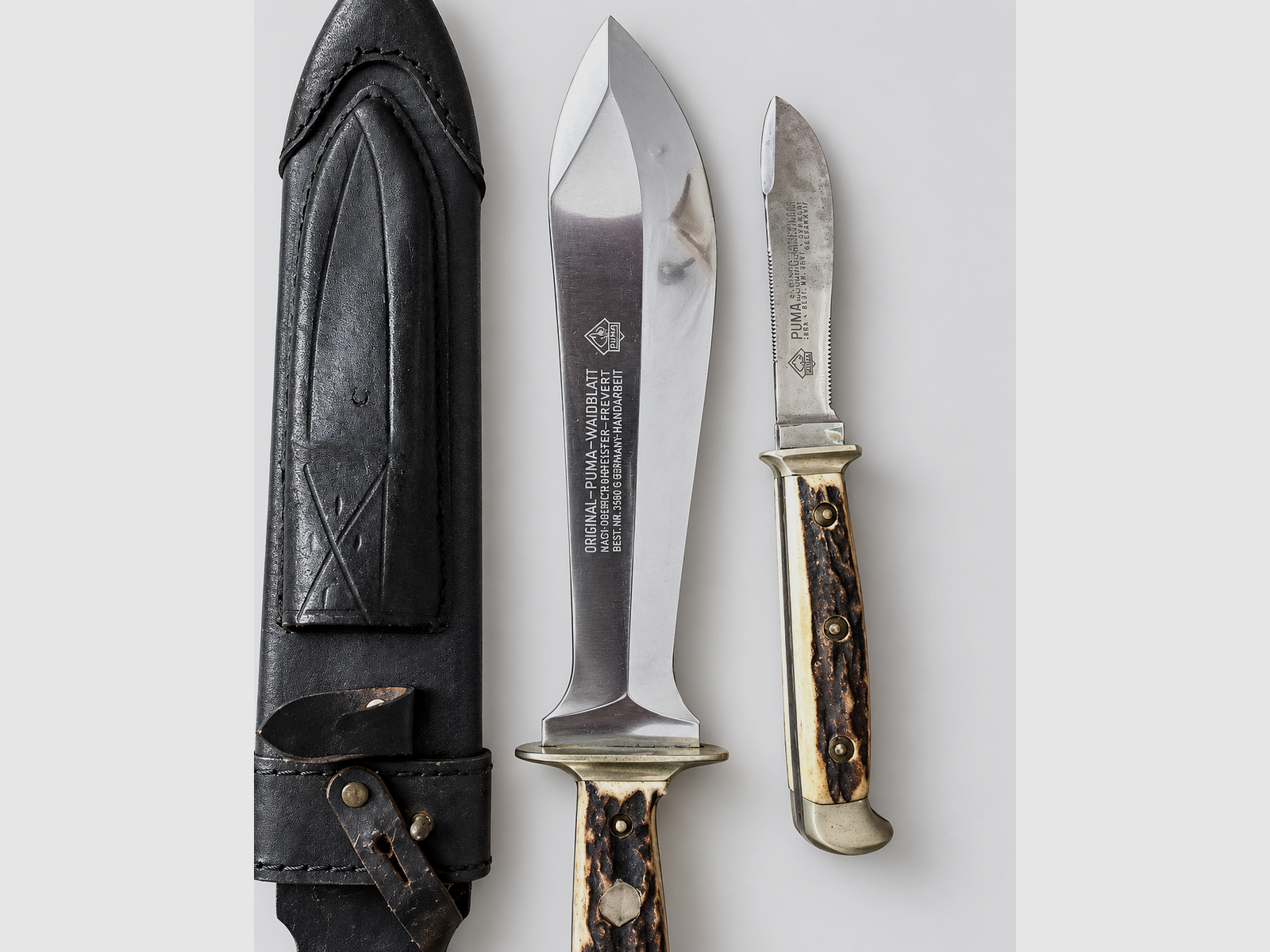 Original PUMA Waidbesteck nach Frevert 3588/3587 – Waidblatt + Jagdnicker + Lederscheide, Bild 1 von 4