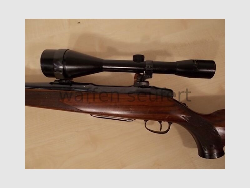 Sauer 80 con Kahles 8x56A4 y SWM
