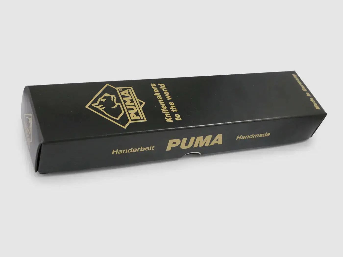 PUMA chasseur blanc, lion