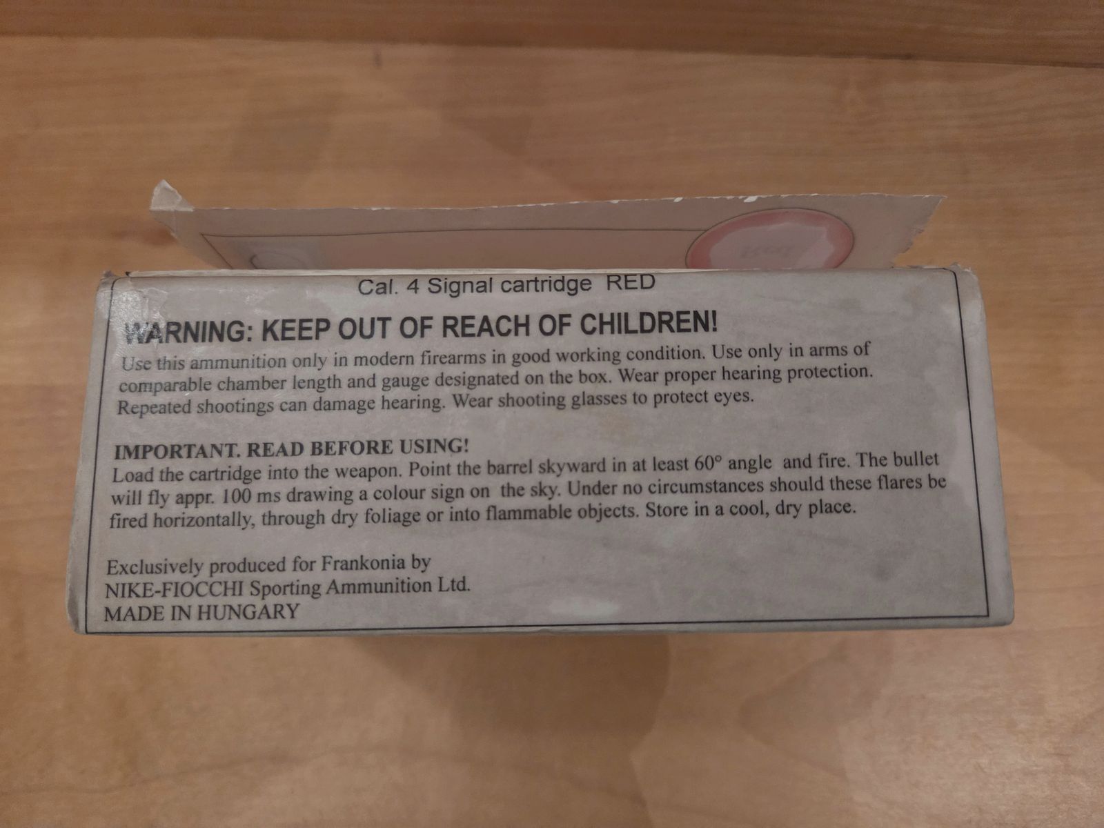 Flare gun with red signal ammunition