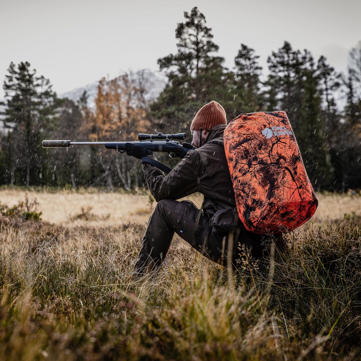 Pantalones de caza FJÄLLRÄVEN Barents Pro M Camuflaje Verde / Bosque Profundo