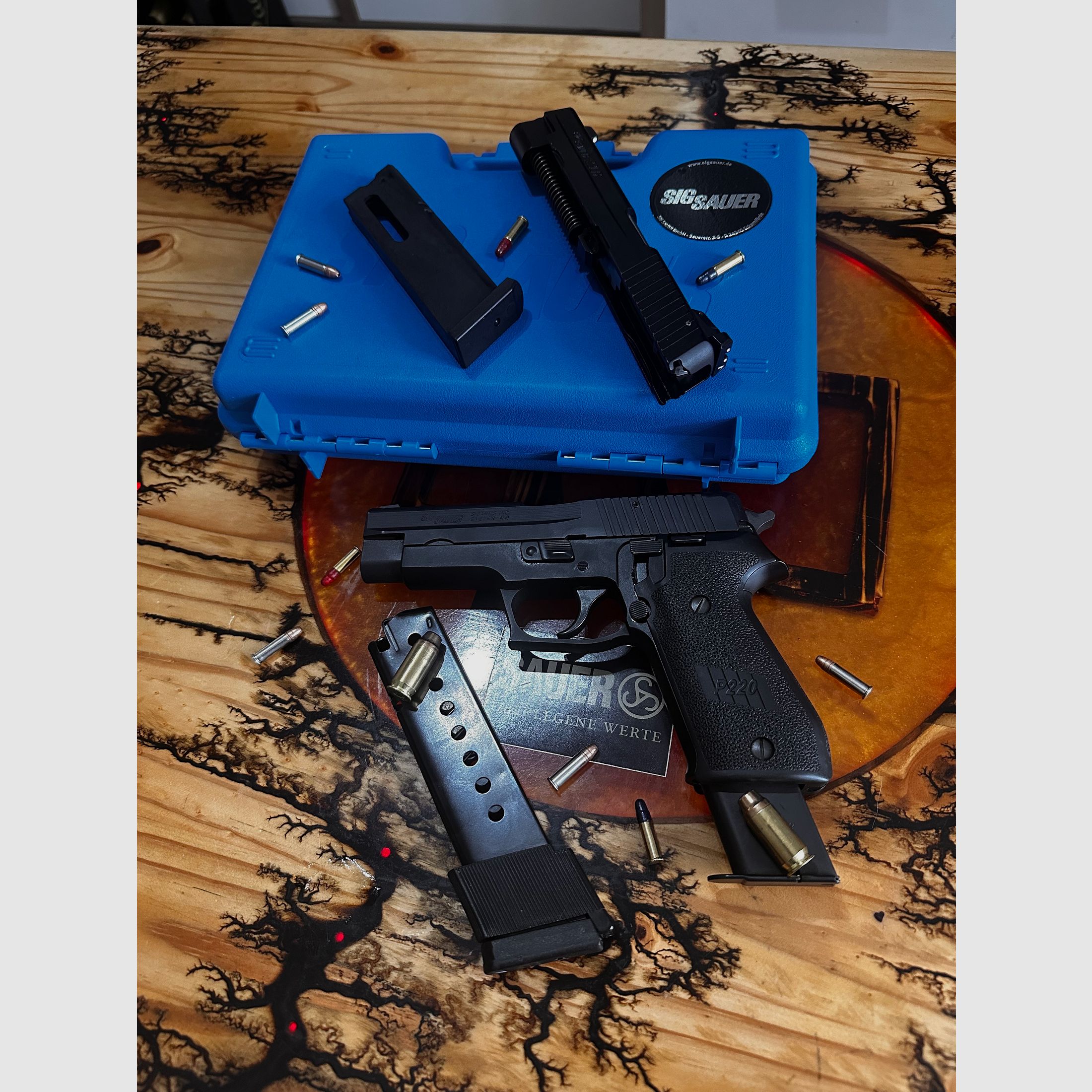Sig Sauer P220, caliber 45 ACP including interchangeable system 22 lfb