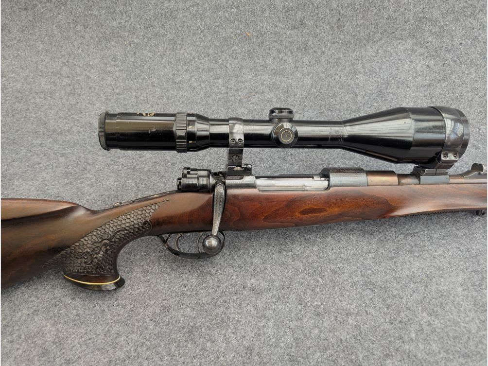 Mauser Mod 98 with animal engraving and stalking safety