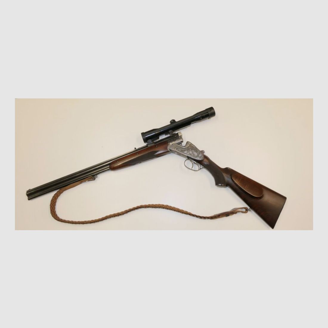 Merkel E313 mit jagdlichen Tiergravuren