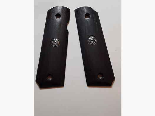 Griffschalen der Colt 1911 oder ME Sport 1911, siehe Bild. 