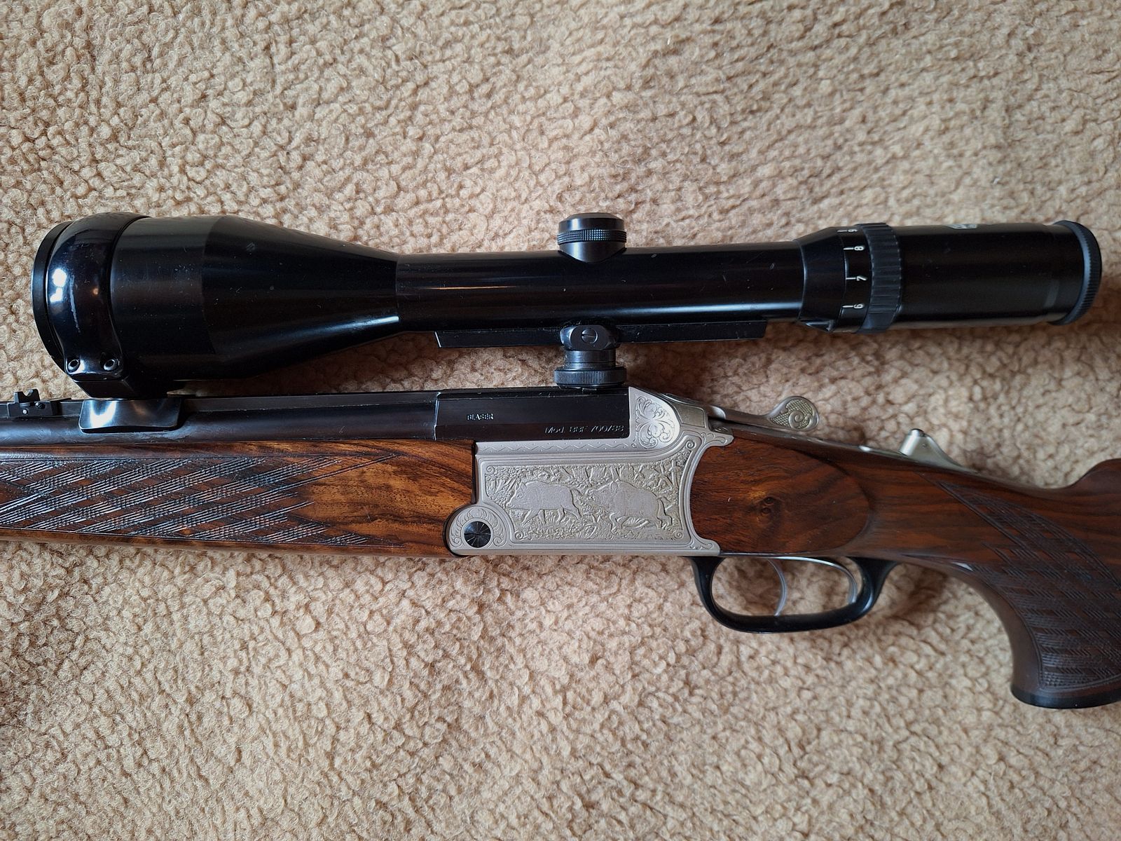 Escopeta combinada de Blaser, modelo BBF 700/88, calibre 12/70 cañón de escopeta, .30-06 cañón de rifle, visor Schmidt & Bender 2,5 - 10x