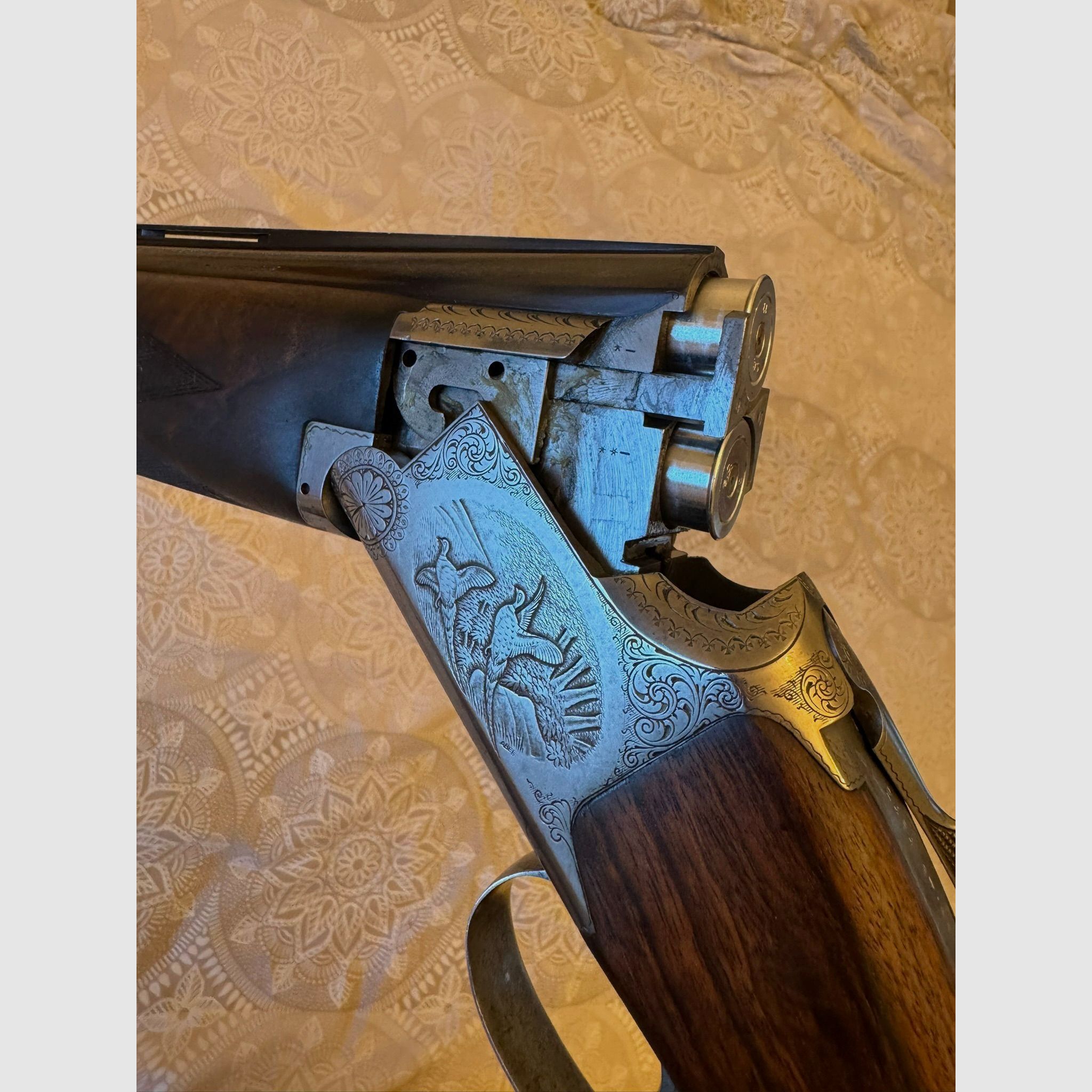 FN Browning B25 "Game Gun" B2G – Hand engraving, cal. 12/70 over-and-under shotgun