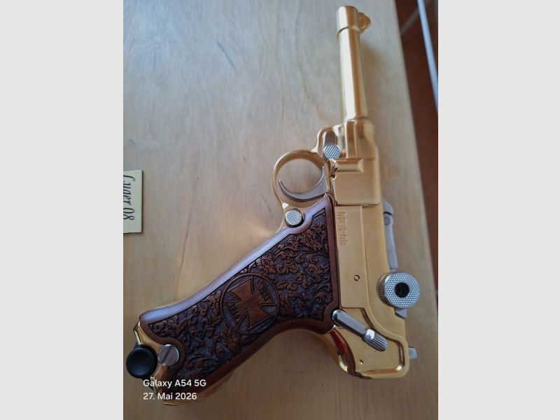P 08 kal 9mm PAK verguld, in houten kist, ongebruikt