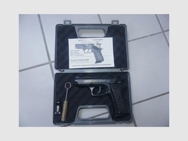 Record 2015 Cal. 9mm PAK New with case, blank firing adapter, brush, manual from collection plus 50 rounds of ammunition