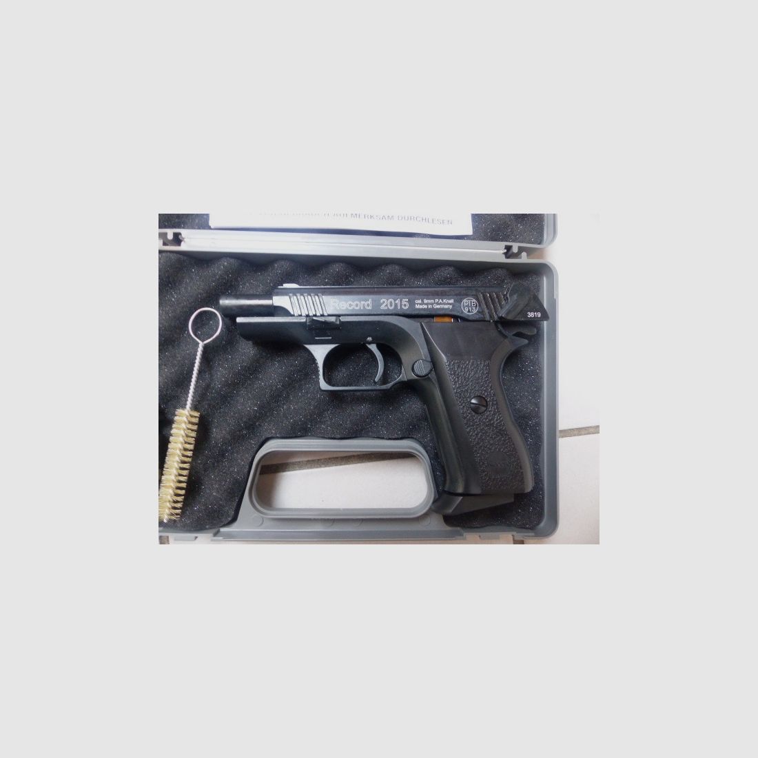 Record 2015 Cal. 9mm PAK New with case, blank firing adapter, brush, manual from collection plus 50 rounds of ammunition