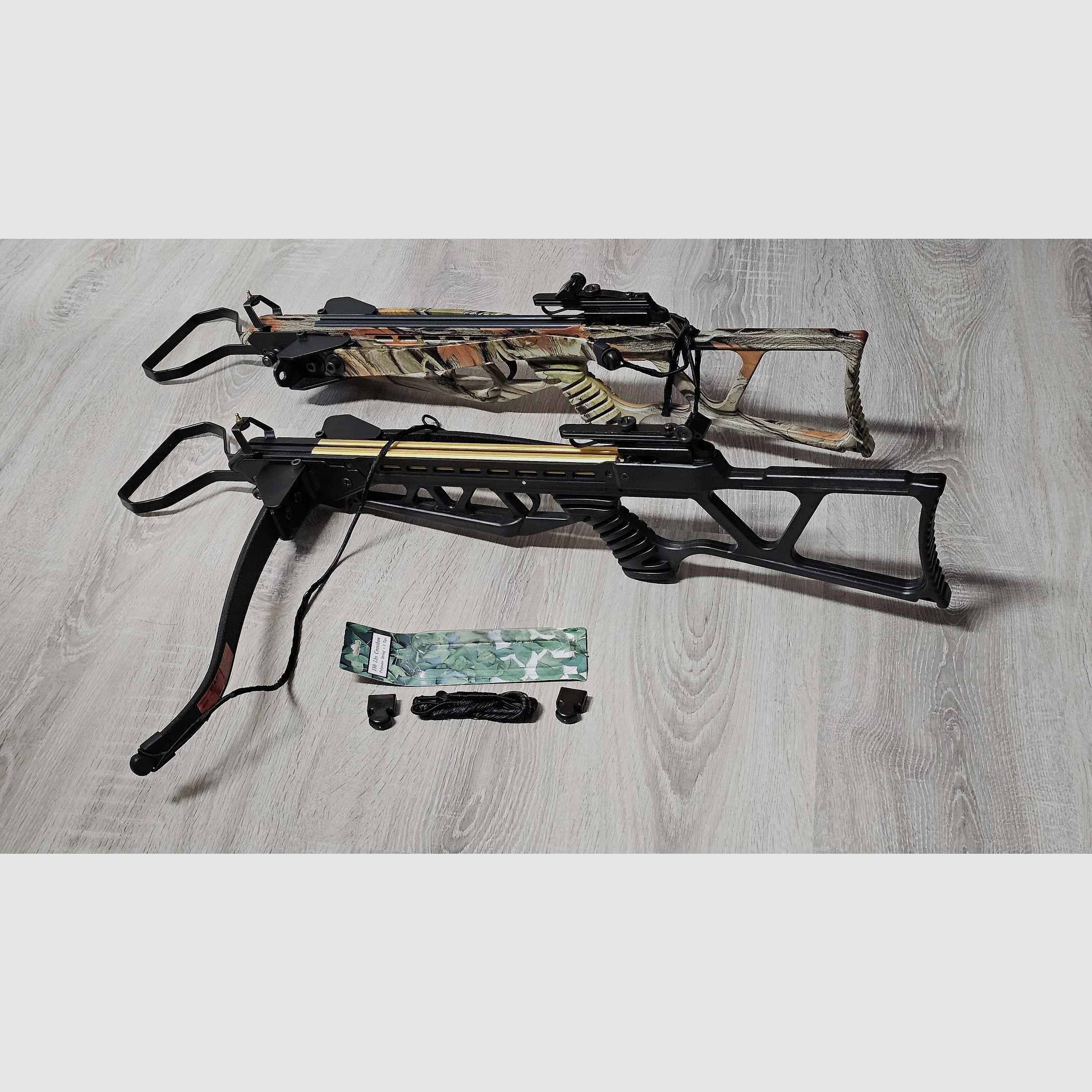 Recurve crossbow double set: 2x Skeleton Hunter 120 lbs (Camo & Black) foldable, 45 bolts, spare string