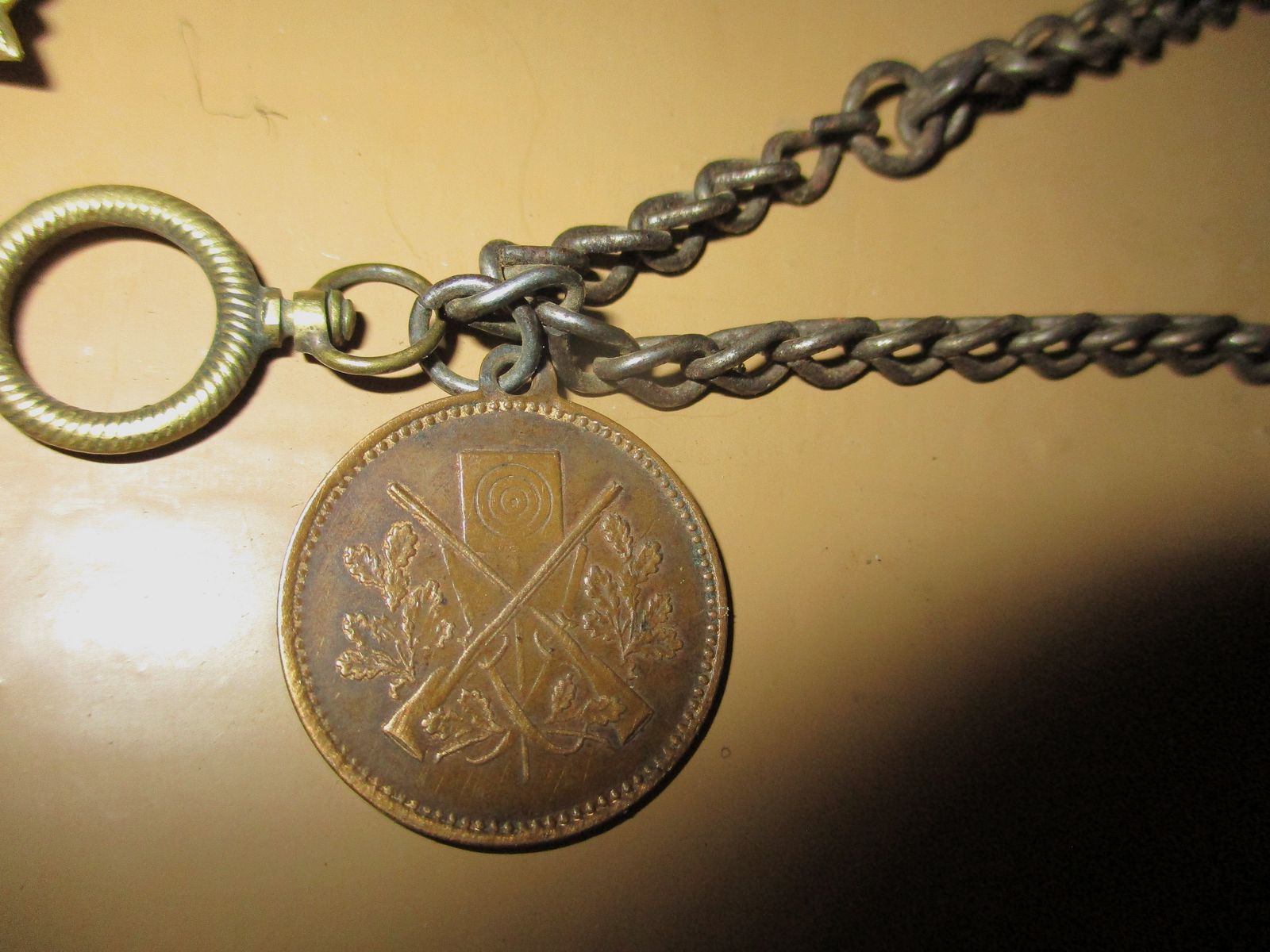 Swiss army knife, among other things, old metal ammunition box, medal on chain, among other things, military