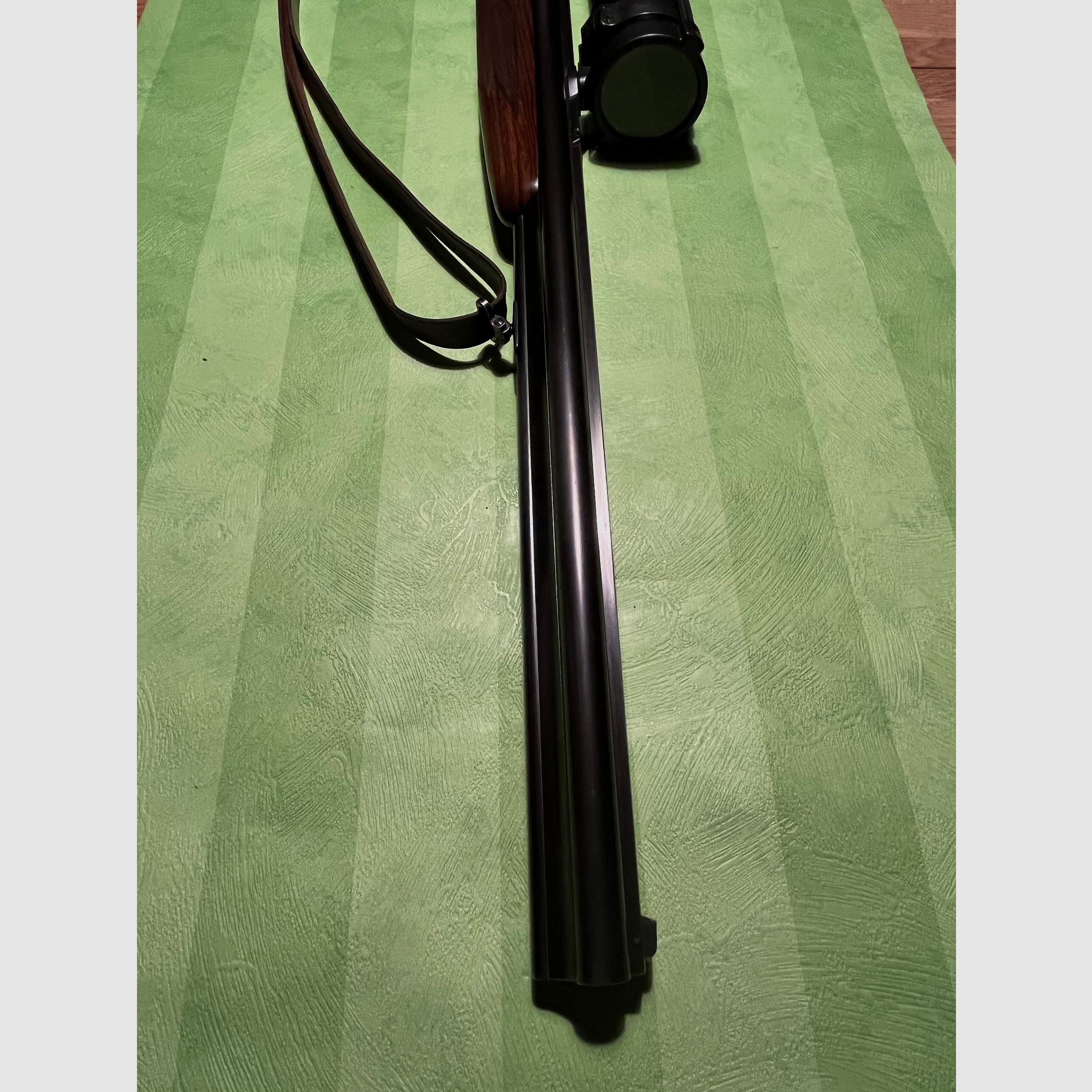 Krieghoff Plus Drilling mit 2 Schloss Handsp. im Kaliber 20/76,7x65R,.22 Hornet von vorne verstellbarer E Lauf, Zeiss HT 3-12x56 L.abs. 60 auf Schwenkmontage u. höhenverstellbare Schaftrücken