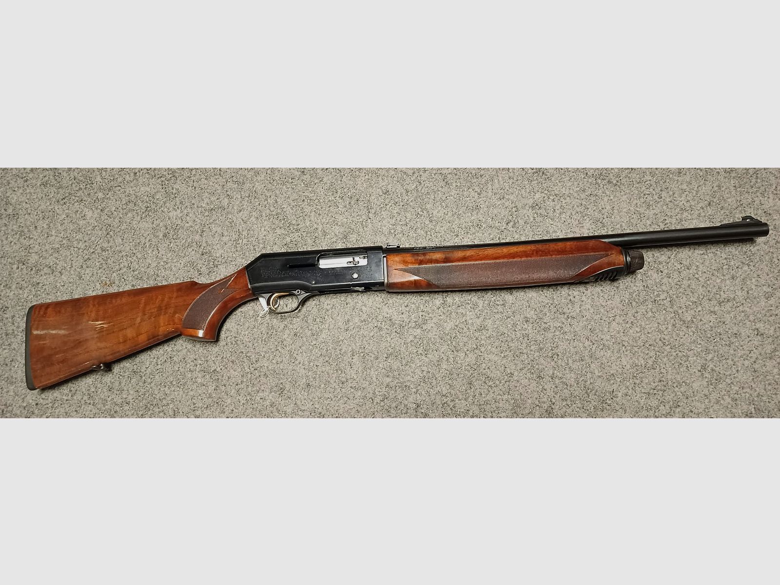A 38 Beretta AL 390 Silver gladloopgeweer kal. 12