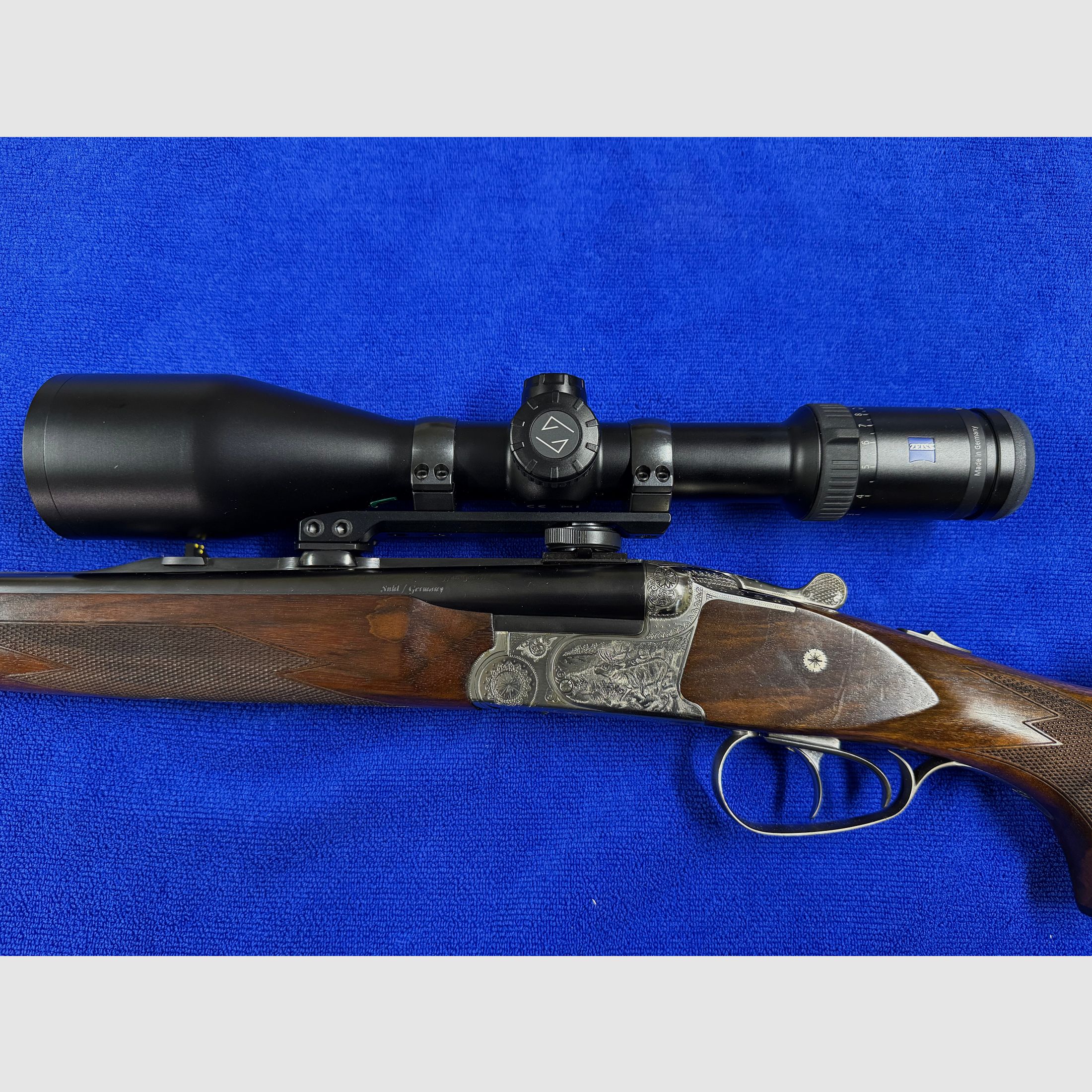 Merkel Doppelbüchsdrilling DR 961L avec lunette ZEISS Victory HT 3-12x56