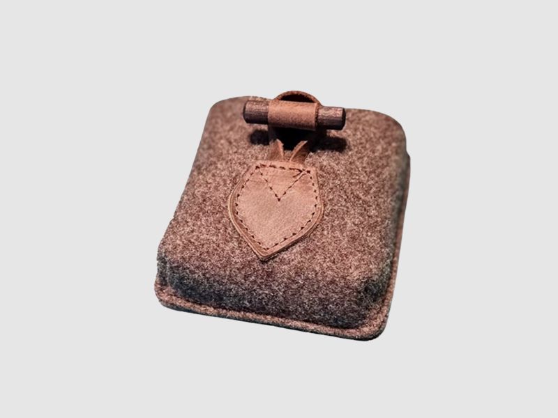 Ammunition case made of wool felt with leather details