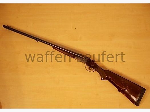 Fusil à deux canons Forest laissé en couleur et gravé