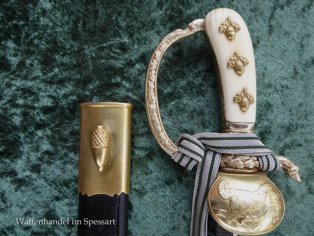 Stag knife with a guard vessel in ornate design from the time of World War II.