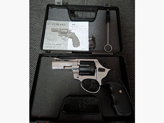 Zoraki R2 3 Inch SINGLE PIECE.Description Dear eGun community,  for sale is a Zoraki R2 3" in caliber 9 mm R.K. in an extraordinary duo-tone finish chrome/black.  The revolver features the chrome-plated frame and barrel as well as a black cylinder and black grip panels. The black cylinder originally comes from another revolver and was installed on this piece. This created a very interesting and visually appealing duo-tone combination that was never regularly available on the open market and does not correspond to the series version.  Another visual highlight is the red-colored front sight, which gives the revolver an additional individual accent.  The revolver has been fired only a little by me and is in very good, almost like new condition. Technically, the revolver is fully functional.  Proof: CB (2021)     Scope of delivery:  - Zoraki R2 3" – PTB 1007  - Original case  - Original papers  - Cleaning brush  - Firing cup     A great opportunity for collectors and lovers of Zoraki revolvers looking for an unusual duo-tone finish.     Please be sure to observe the conditions in MyGun!    Type approval for pistols / revolvers PTB no.:   1007 further information:  Description Dear eGun community,  for sale is a Zoraki R2 3" in caliber 9 mm R.K. in an extraordinary duo-tone finish chrome/black.  The revolver features the chrome-plated frame and barrel as well as a black cylinder and black grip panels. The black cylinder originally comes from another revolver and was installed on this piece. This created a very interesting and visually appealing duo-tone combination that was never regularly available on the open market and does not correspond to the series version.  Another visual highlight is the red-colored front sight, which gives the revolver an additional individual accent.  The revolver has been fired only a little by me and is in very good, almost like new condition. Technically, the revolver is fully functional.  Proof: CB (2021)     Scope of delivery:  - Zoraki R2 3" – PTB 1007  - Original case  - Original papers  - Cleaning brush  - Firing cup     A great opportunity for collectors and lovers of Zoraki revolvers looking for an unusual duo-tone finish.     Please be sure to observe the conditions in MyGun!    Type approval for pistols / revolvers PTB no.:   1007 further information: