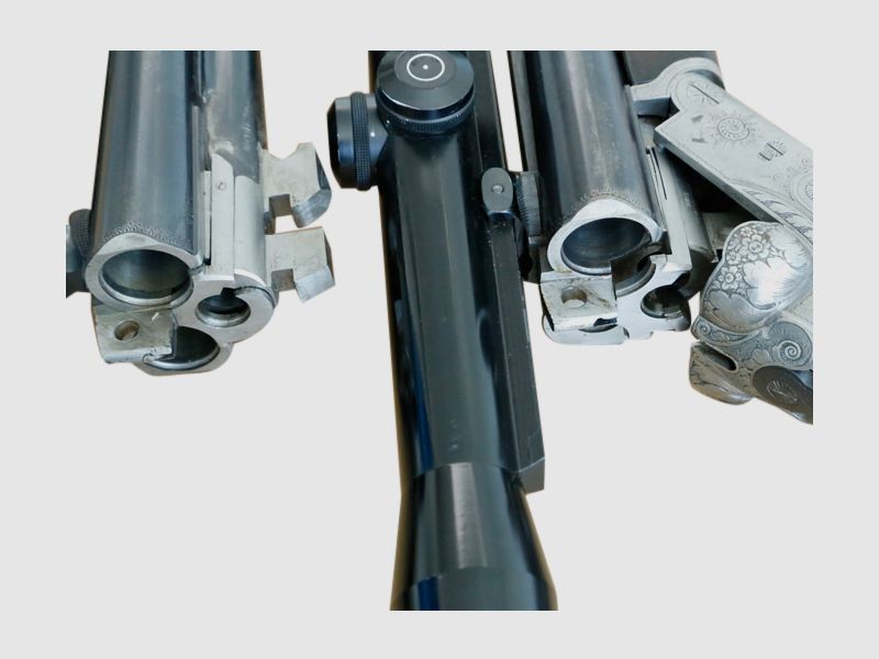 Suhler double rifle drilling cal. 2x8x60R and 12/70 with interchangeable barrel cal. 2x12/70, 8x60R and ZF, additional