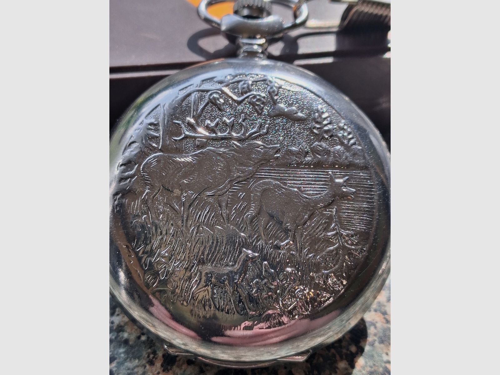 Zakhorloge met jachtthema