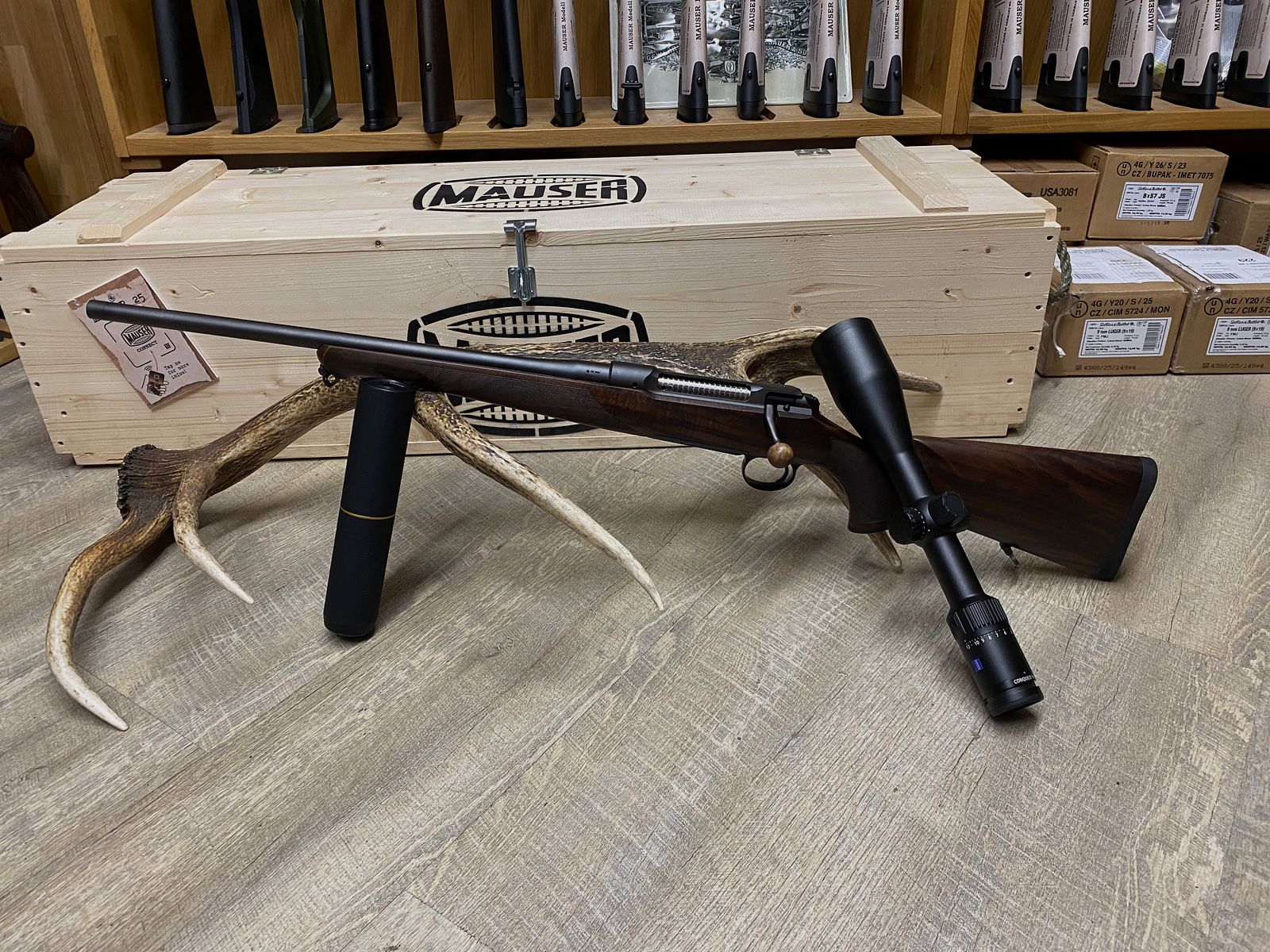 Sauer 101 Artemis, left, with Zeiss Conquest V4 3-12x56
