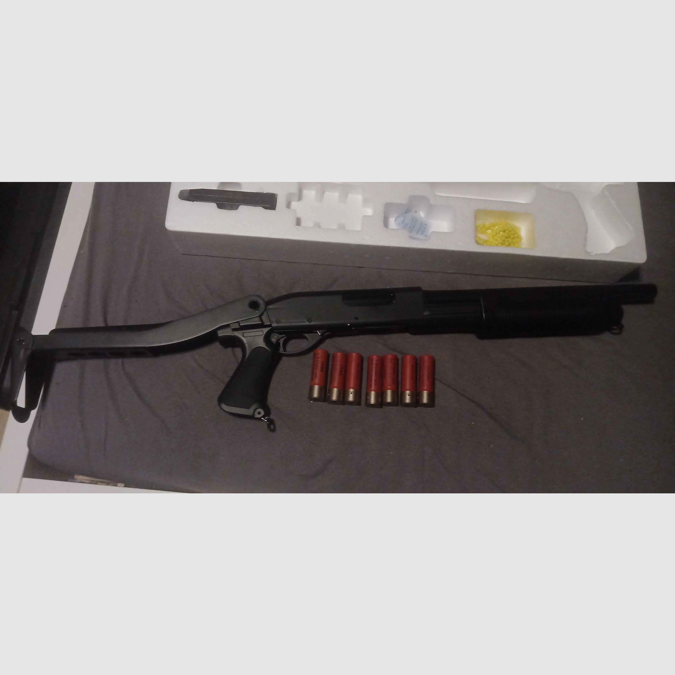CM.352 shotgun with 7 magazines