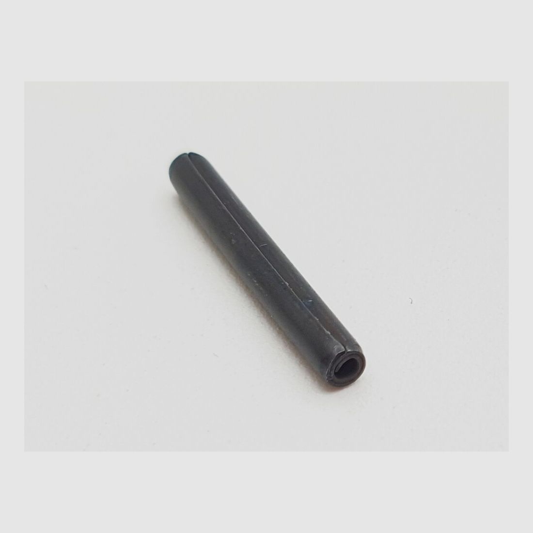 Spiral pin [21] for extractor Heckler und Koch P9s self-loading pistol HK P9S