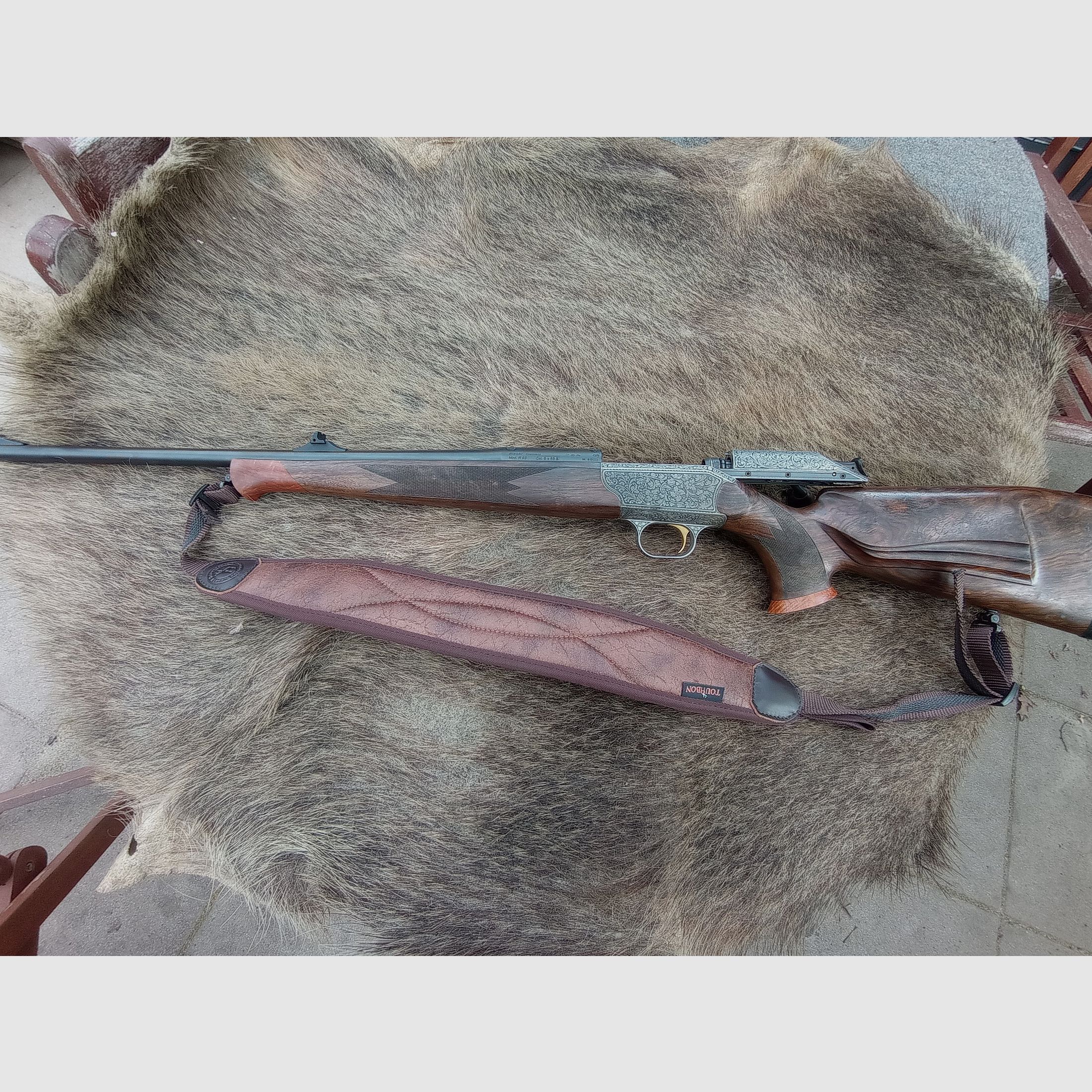 Blaser R93 vollgraviert mit unbenutztem Lauf in 8x68S Holzklasse 9 