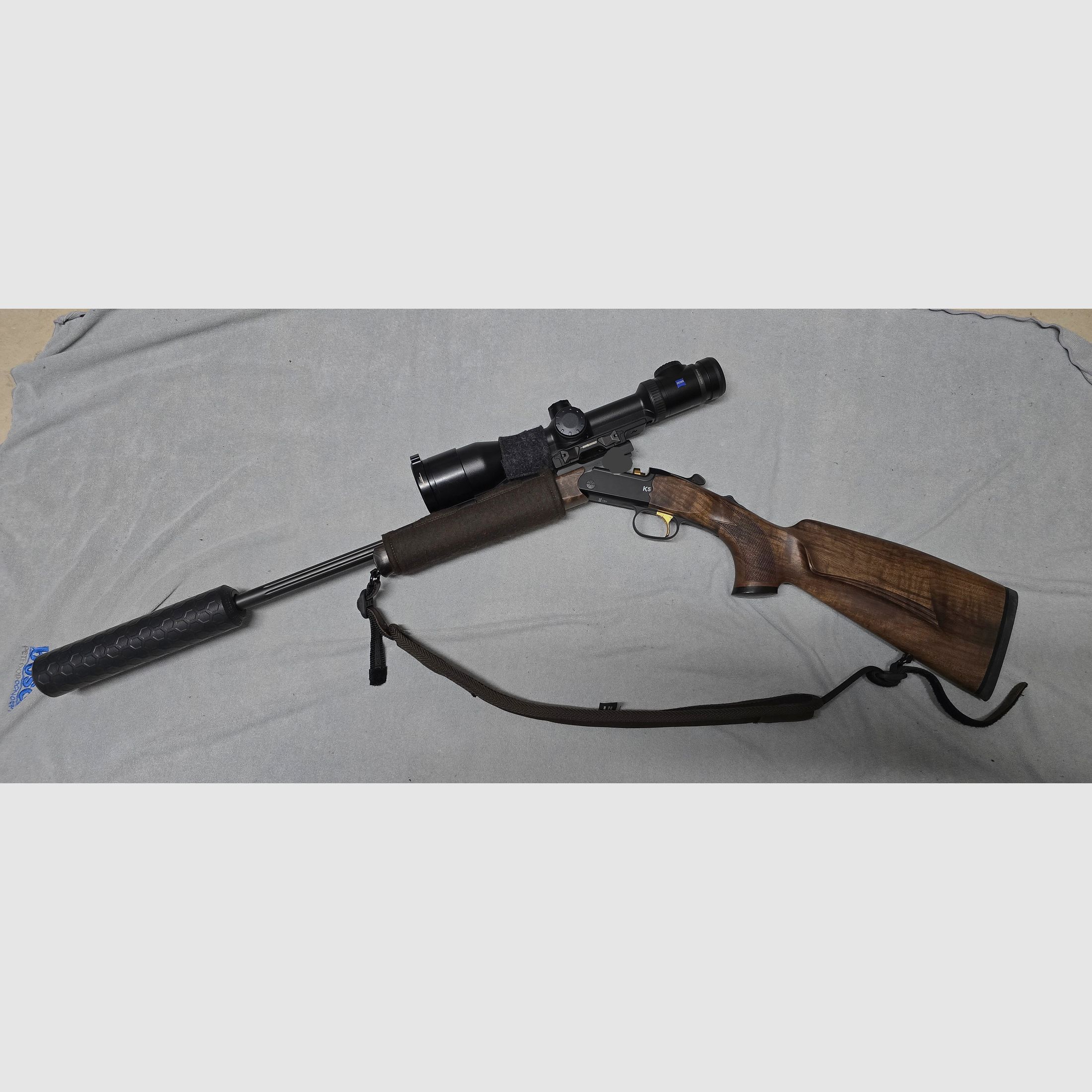 Merkel K5 Extrem with ZEISS V8 1.8-14x50 riflescope with rail and VANWARD Hunter PRO, overbarrel titanium suppressor for caliber .30