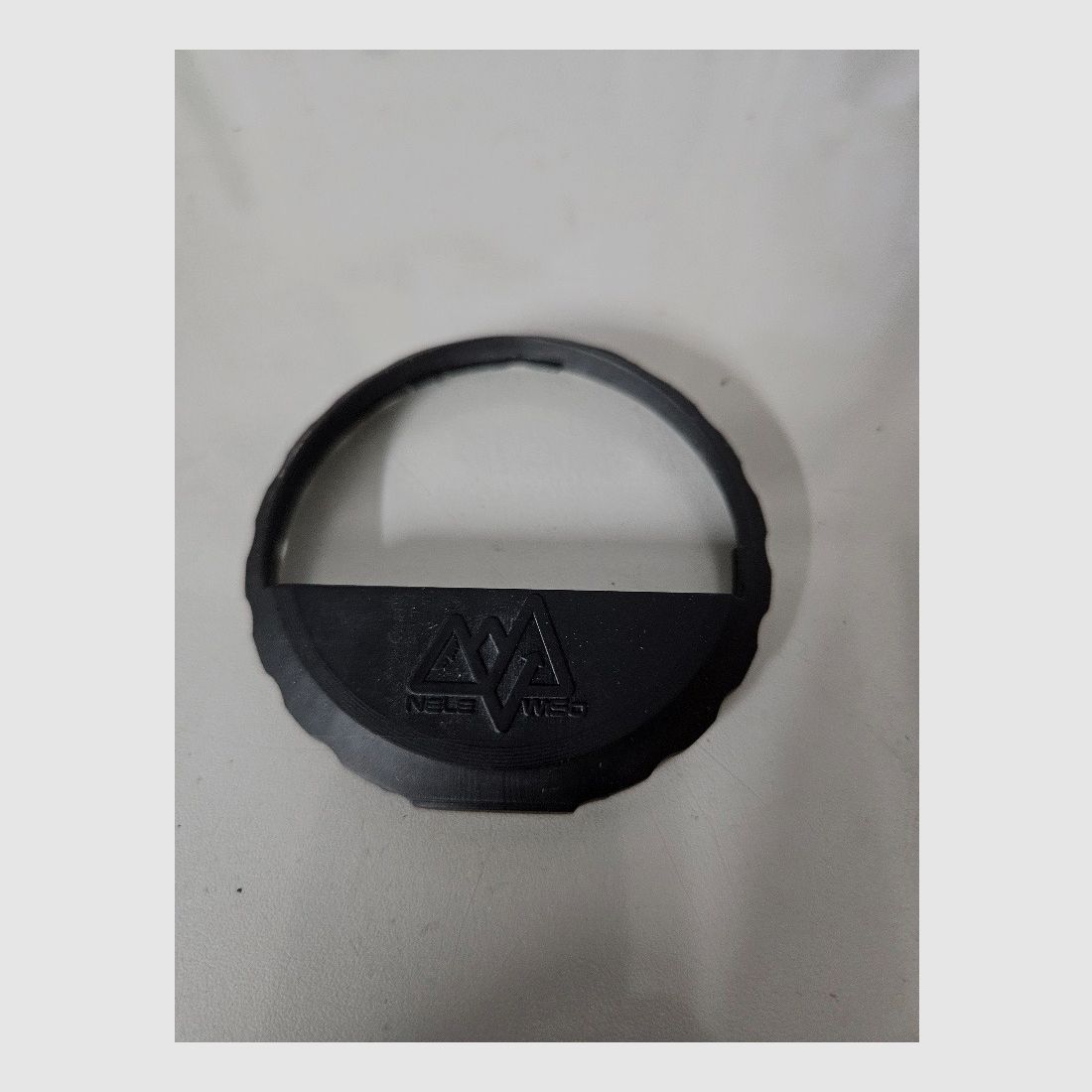 Objective lens aperture sound suppressor anti-reflection