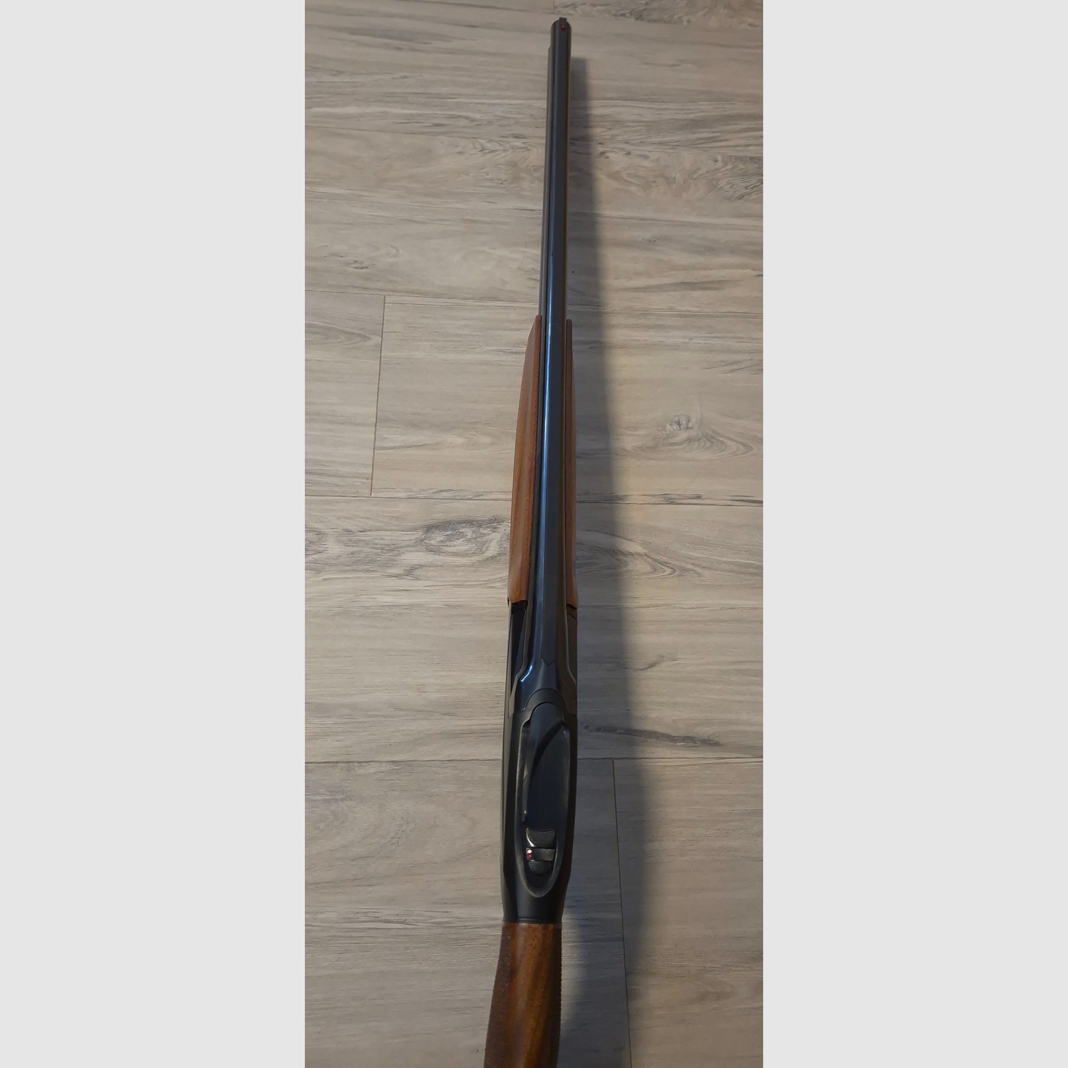Benelli 828U Black over-and-under shotgun caliber 12/76