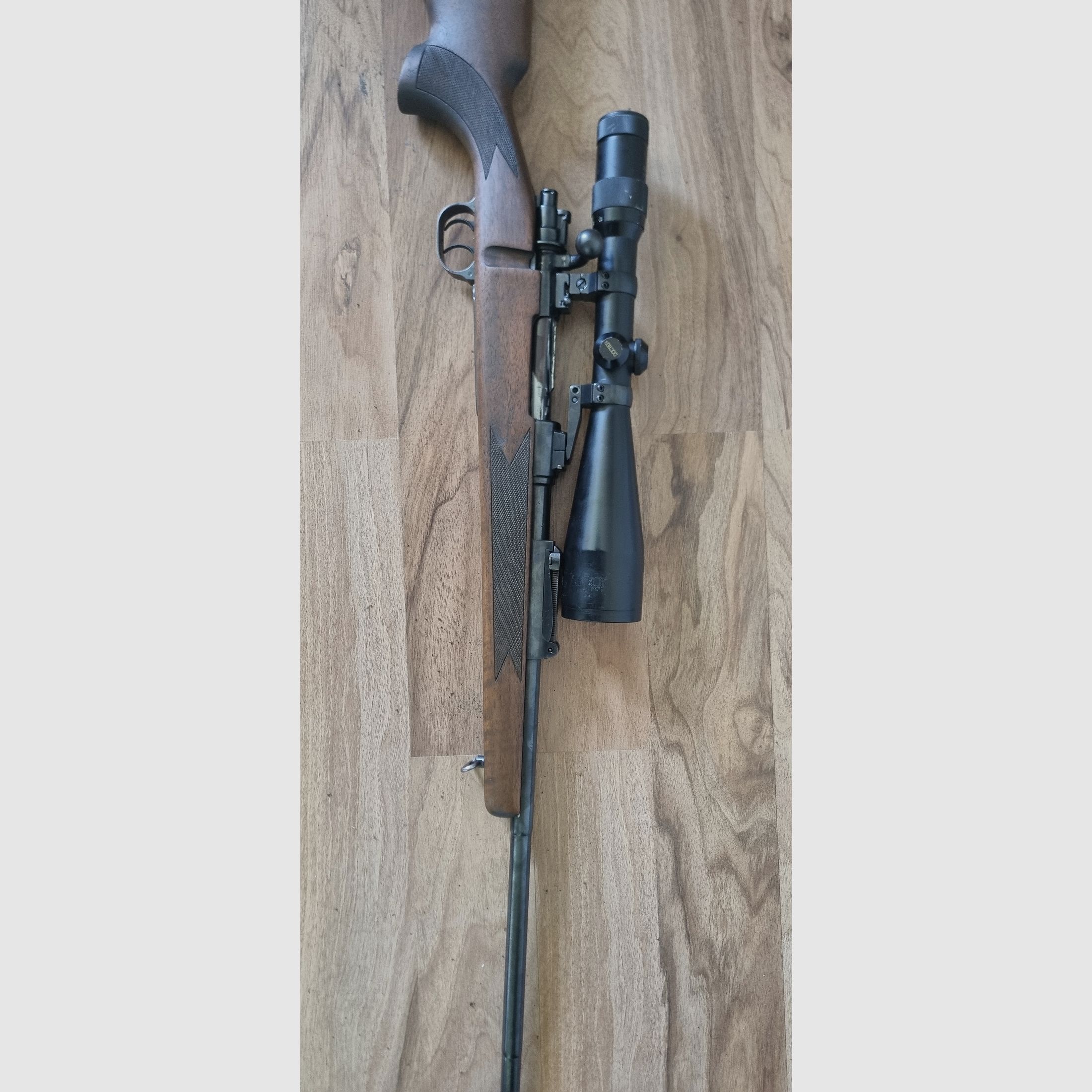 Voere Kufstein Mod. 98 met Docter Optiek VZF 3-12 x 56 M