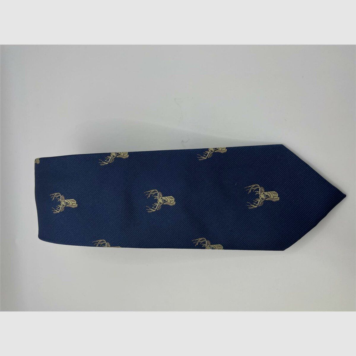 Cravatta blu scuro motivo cervo beige