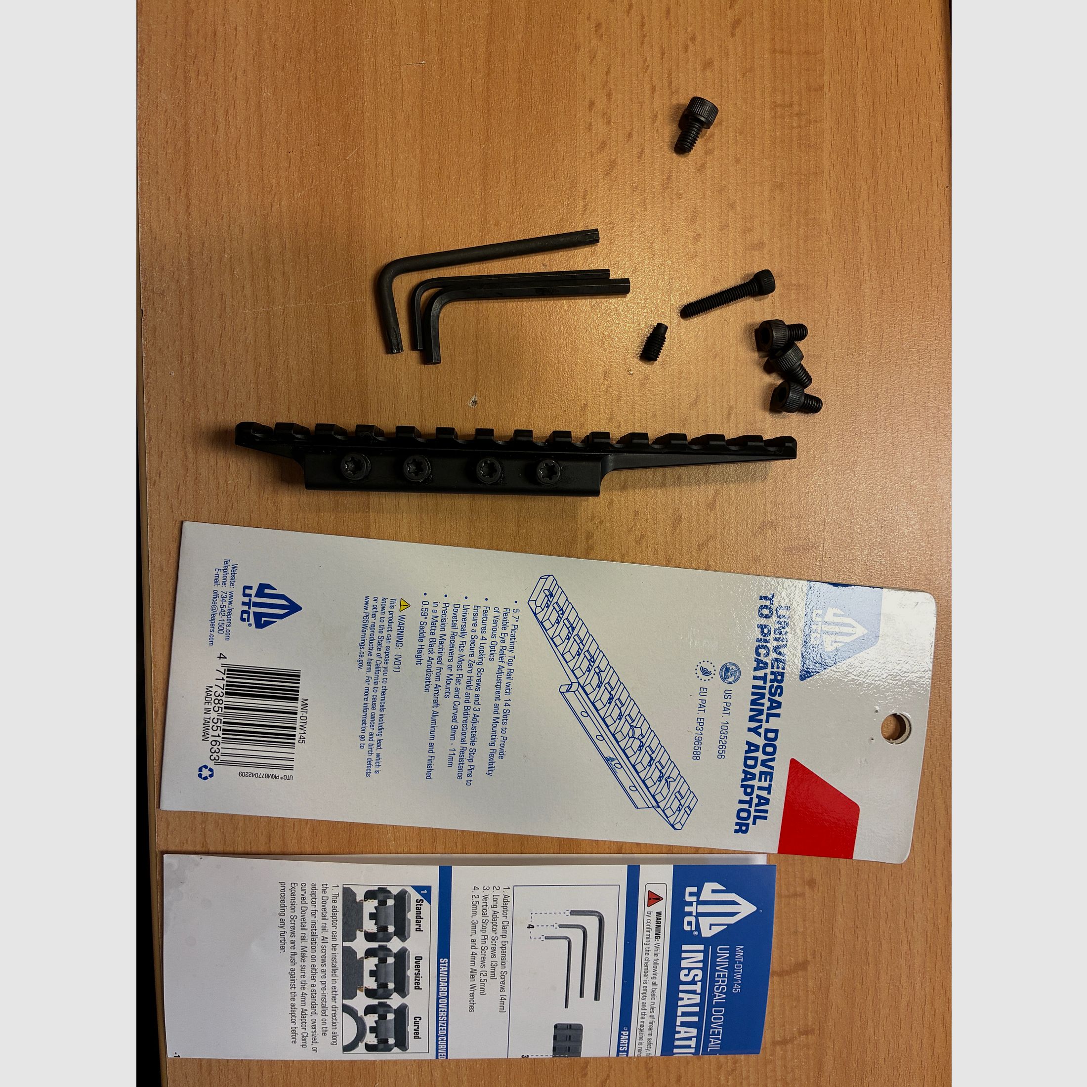 Adaptador UTG Low Profile de Dovetail a rieles Picatinny/Weaver MNT-DTW145