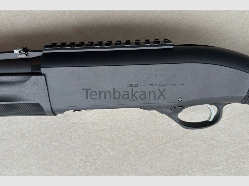 Beretta 1301 Comp incl. magazijnuitbreiding en PK-rail 12/76