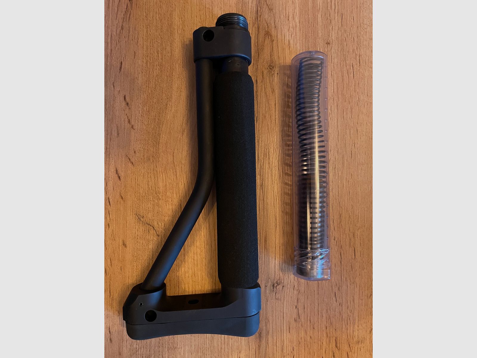 ACE crosse pour systèmes AR incluant tube et ressort