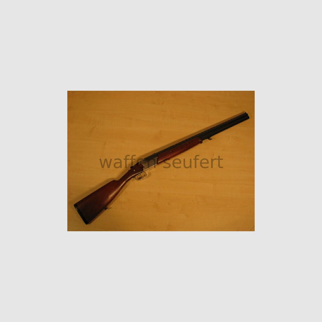 Toz 34EP over-and-under shotgun with ejector
