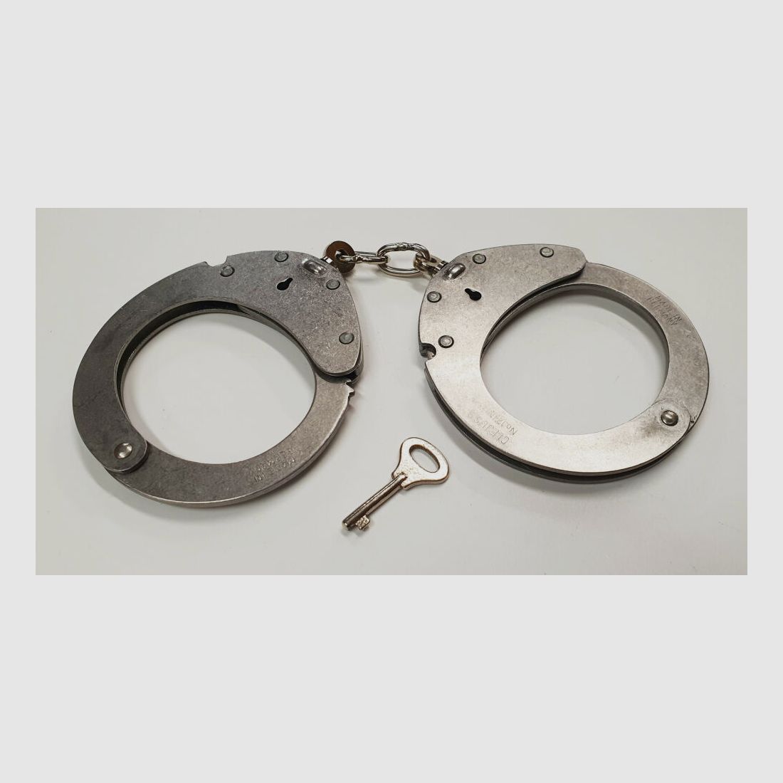 CLEJUSO Clemen & Jung e.K. Handcuff CLEJUSO No. 12 INOX, stainless steel handcuff, made in Germany, used