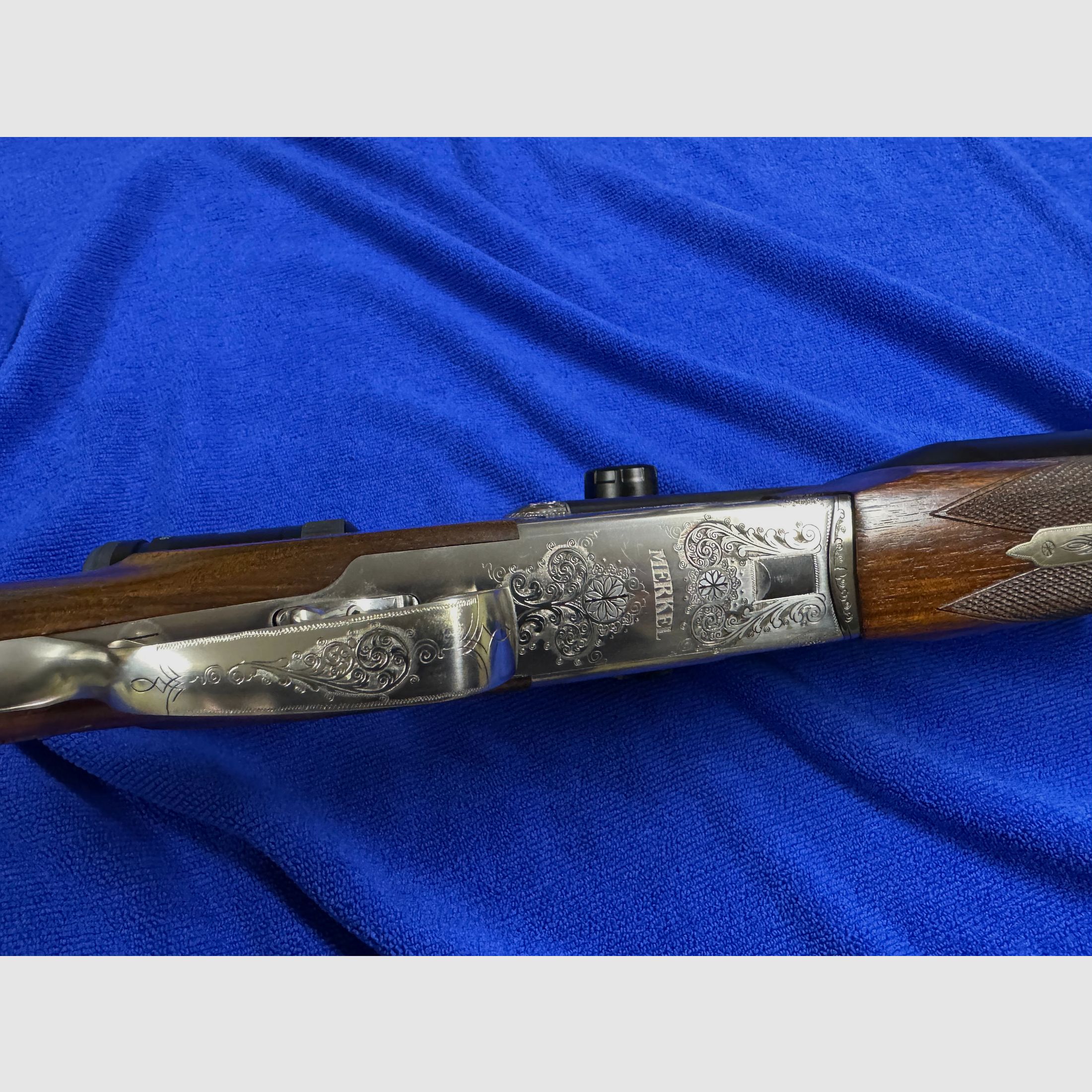 Merkel Doppelbüchsdrilling DR 961L con visor ZEISS Victory HT 3-12x56